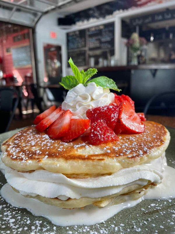 Buttermilk Pancakes Stack with Strawberries & Cream $17.99