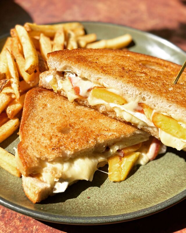 Grilled Peach and Brie Melt on sourdough with fries $16.99